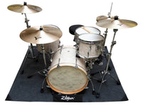 4.5'x5.5' drum rug with weights in all 4 corners and kick block.
